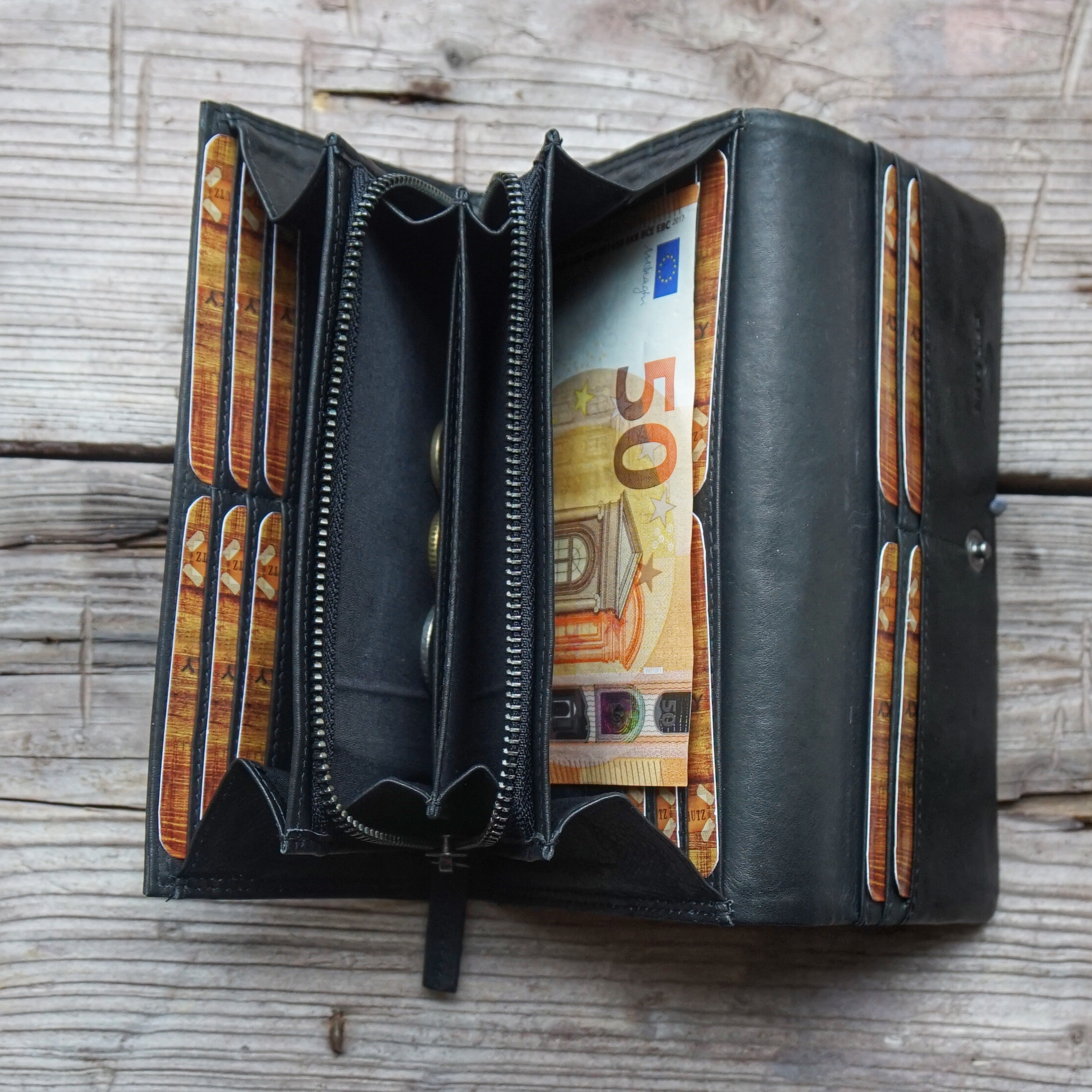 Handytasche aus Leder Montreal  Geldbörsen, Rucksäcke und Taschen in  coolem Look und funktionellem Design